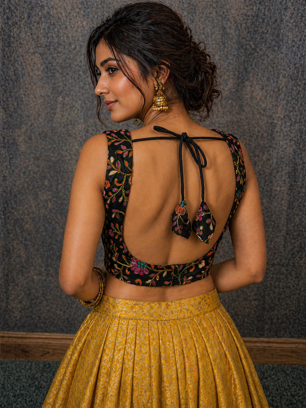 sleeveless black embroidered blouse