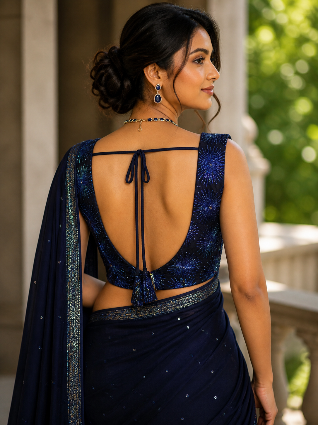 Sleeveless navy blue blouse with sequin